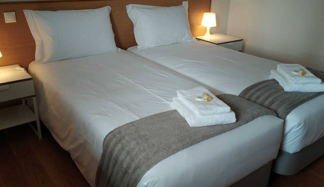 Central Suites Arouca com estacionamento gratuito