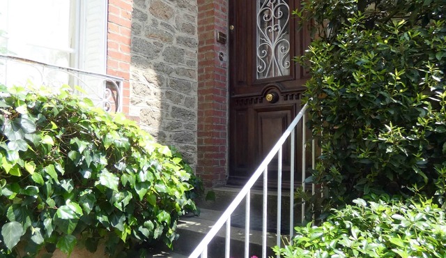 Centrally Located Traditional Townhouse With Modern Amenities and Pretty Garden