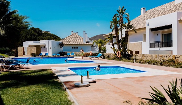 Chalet 'Comodo Triplex La Cala Golf' with Shared Pool, Wi-Fi and Air Conditioning