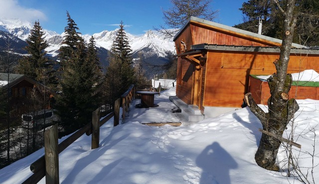 Chalet with terrace and breathtaking view. The grounds are adjacent to the chalet for BBQs etc.