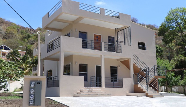 Charming 1-bedroom apt with AC and WiFi in Clarkescourt Bay near to the Marina.