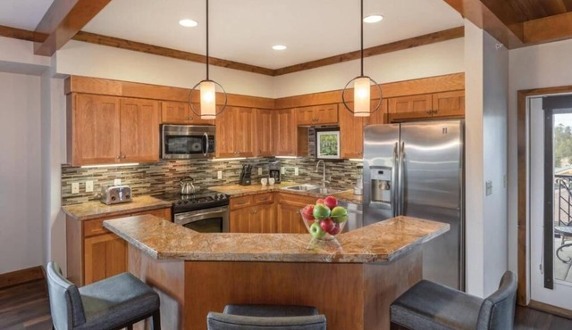 Charming 2-bedroom condo in West Yellowstone with Fireplace and fitness room