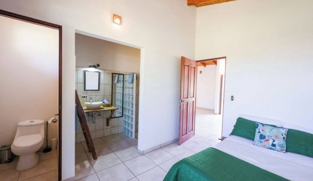 Charming 2-bedroom bungalow in peaceful Guanacaste with AC and Swimming pool.
