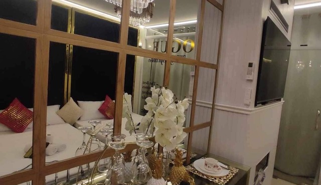Charming 2-bedroom condo with Cinema Room, AC, WiFi in wonderful SM Mall of Asia