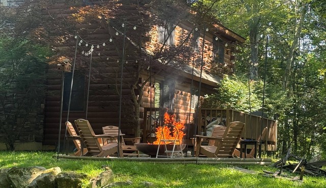 Charming 2-bedroom cabin on 25 acres with loft space and full basement