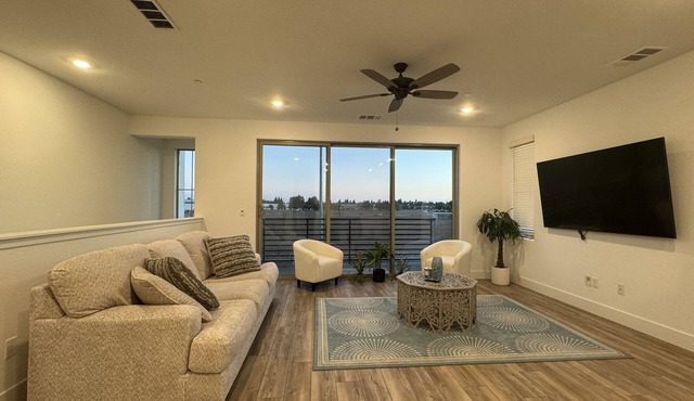 Charming 2-bedroom townhome with garage, pool access, & all utilities included.