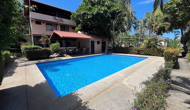 Charming 2-bedroom condo with AC, Fast WiFi, 5 Minutes Walk to the Beach!