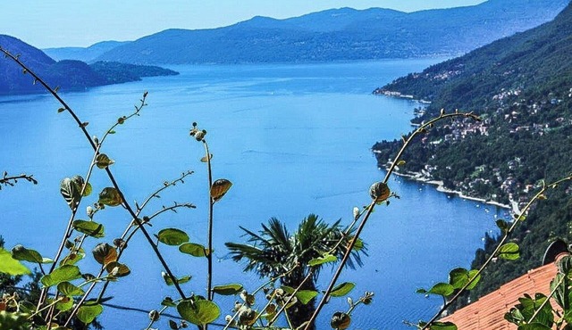 Charming 3-room rustico in a quiet & sunny location with beautiful lake view