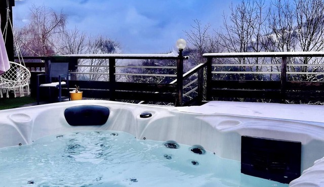 Charming 4-bedroom chalet in mountain vilage Les Clefs with private Hot Tub
