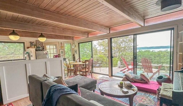 Charming and eclectic treehouse-like home with expansive Puget Sound views