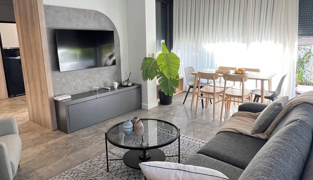 Charming Beachside Apartment with Private Garden