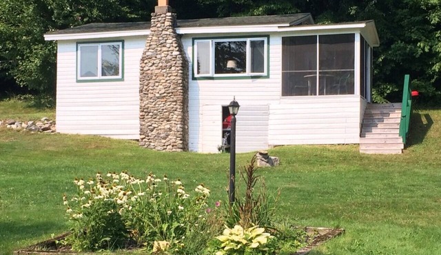 Charming cabin overlooking Lake Dunmore with stunning views of the Green Mts.