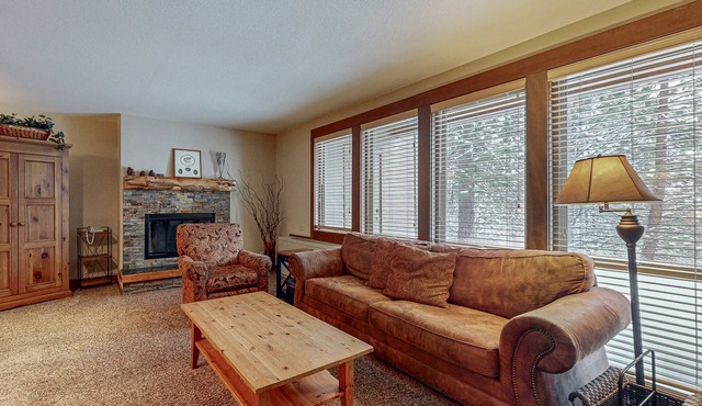 Charming condo with serene views, access to resort amenities, WiFi, and patio