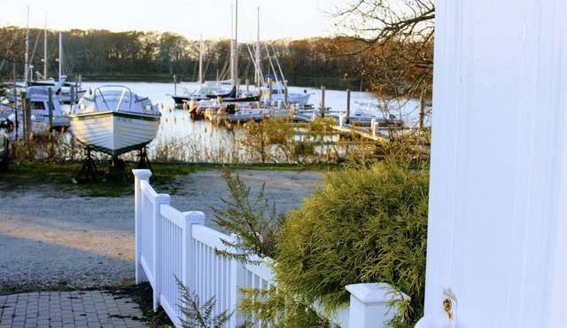 Charming, cottage with gorgeous views of Peconic Bay within a private marina.