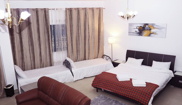 Charming home away from your home with WiFi, fitness room in lovely Sharjah.