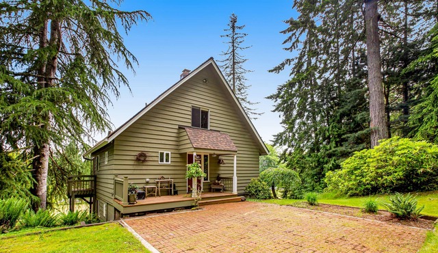 Charming home on 2.58 acres near Langley with ocean view, deck & wood stove