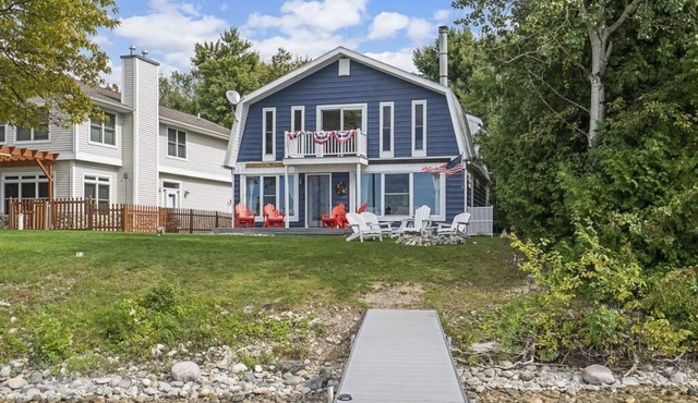 Charming newly updated 4 bedroom 2 full bath Burt Lake home