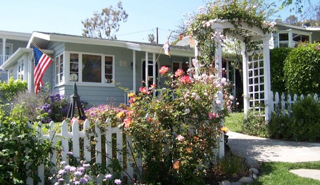 Charming ocean view cottage in desired North Laguna. Short walk to beach & town.