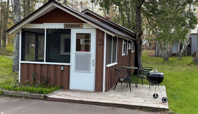 Charming one-bedroom retreat at Miller's Cottages, with screened porch