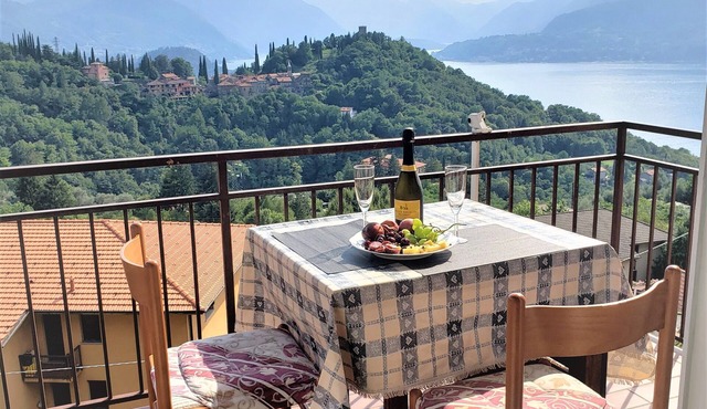 Charming Perledo Retreat with Lake View, Balcony & Parking