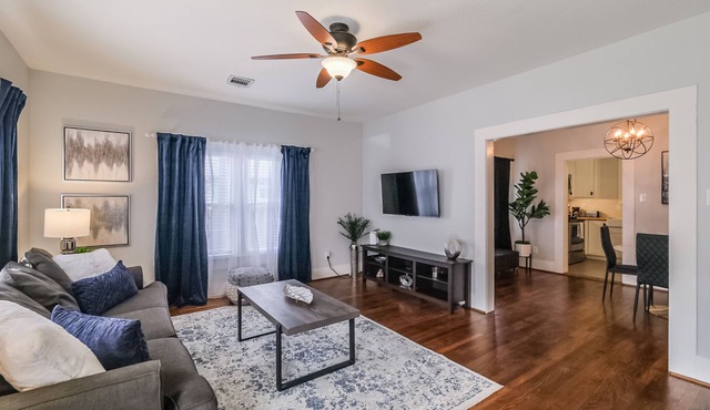 Charming private house sleeps 4 with a large fenced yard, fast WiFi, smart TVs, and ample parking—near the Heights & Downtown. Features a primary king bed for a comfortable stay.