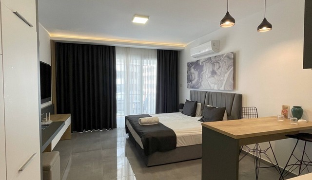 Charming studio with pool, sauna, gym, airco, TV, kitchen & stylish designs