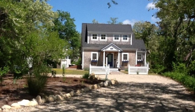 Charming two-storey shingled Cape Cod cottage, off Cape Cod Bay. With priv pond.