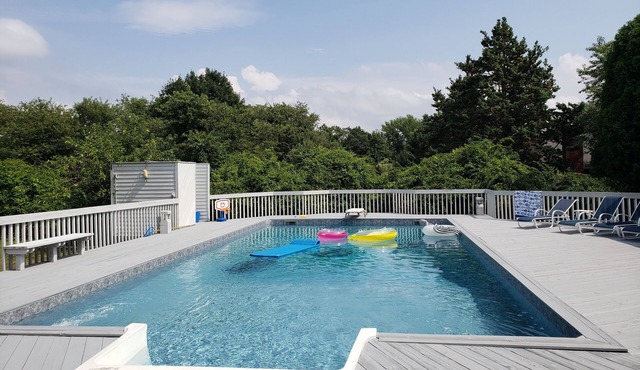 Charming updated home with pool on quiet street. Near Silver Beach
