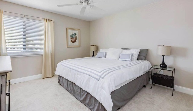 Charming Upstairs Condo with Stunning Water