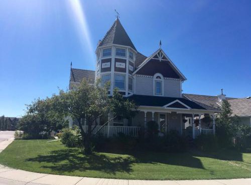 Charming Victorian Home in Okotoks Elegant Comfort Modern Convenience