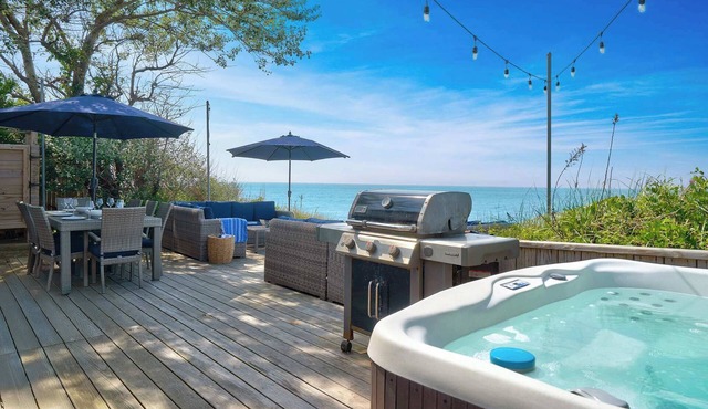 Chic Waterfront Beach House with Hot Tub