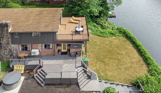 Chic Waterfront w/Hot Tub, Sauna and Sky Deck!
