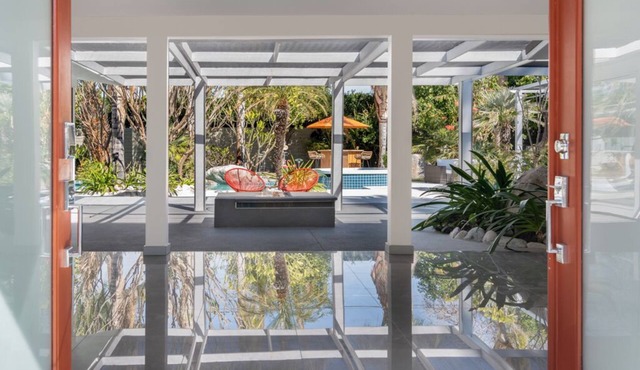 Classic Palm Springs Mid-Century Modern with Tropical Garden Pool + Tiki Bar