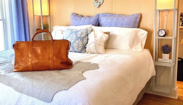 Clean & Modern space with a mix of original warmth and charming renovation.
