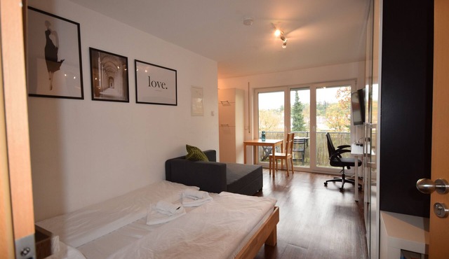 Close to the university with balcony (1.2) - Business-friendly!