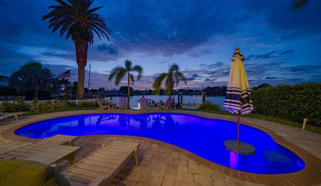 Coastal Elegance: Retreat with Heated Pool, Golf Cart, and Entertainment Haven