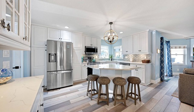 Coastal home on the river, fish off the dock, walk to the beach