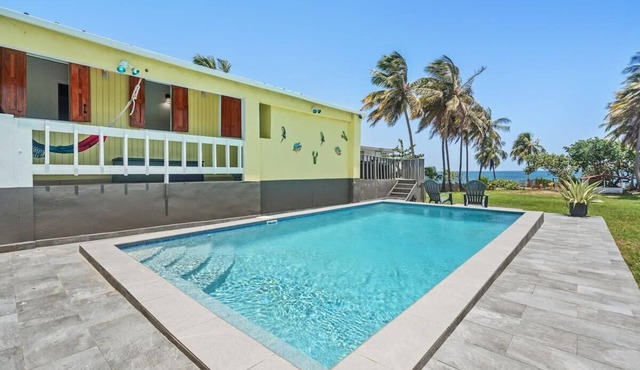 Coco Chalet | Villa with private pool and steps from Playa Peñón Brusi