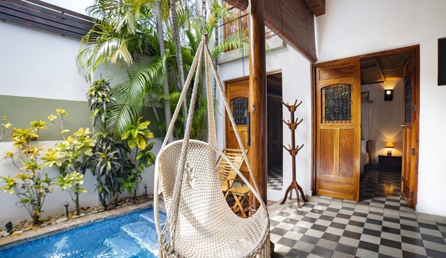 Colonial Elegance and Poolside Retreat