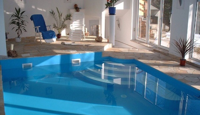 Comfortable apartment with swimming pool and sauna in a quiet location