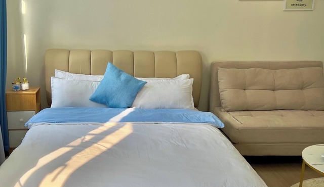 Comfortable 1-Bedroom Condo in Trece Martires with AC and High-Speed WiFi