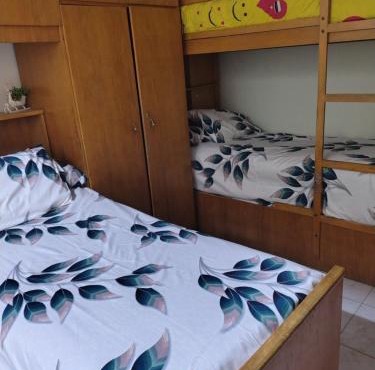 Comfortable 3-Bed Room with Workspace & AC