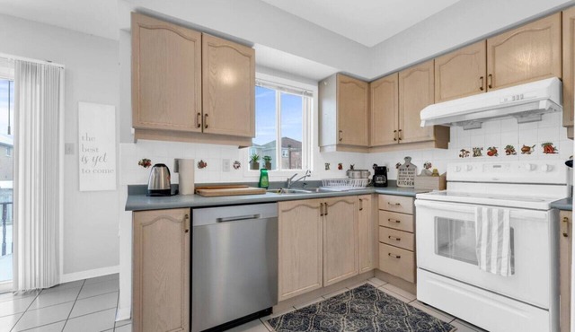 Comfortable 4-Bedroom Retreat with Charming Patio