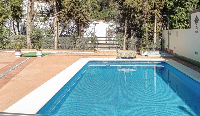 Comfortable and compact apartment in Ribera del Guadiaro apartment complex with community pool.
