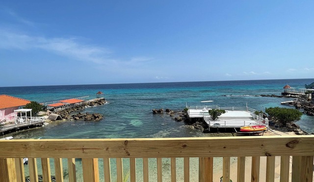 Comfortable, Bright Condo Steps Away From the Beach