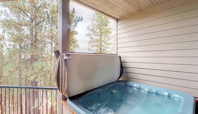 Comfortable condo with private hot tub & great location
