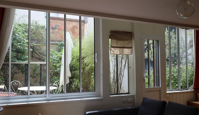 Comfortable, detached cottage with sunny, flower-filled terrace.