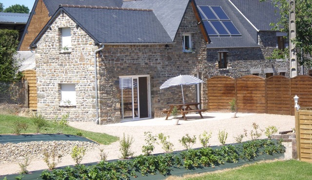 comfortable cottage in the calm of Calvados with heated pool
