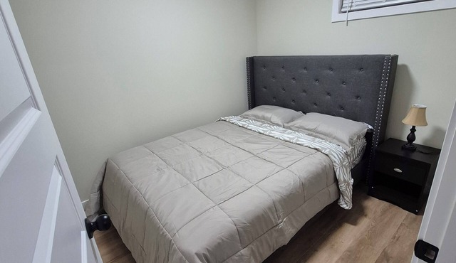 Comfortable one bedroom basement suite in a house. Relaxing & affordable.