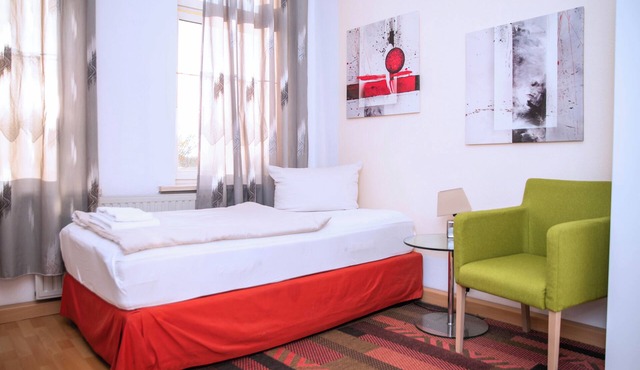 Comfortable single room with shared bathroom